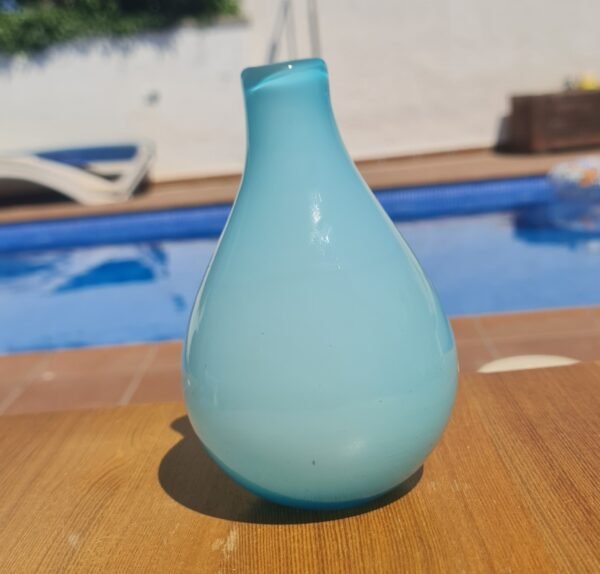 Sky blue cased vase white interior
